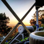 beautiful photos of a solar hot tub on the coast in california at sunset
