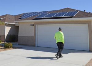 PV modules on a small roof with installer
